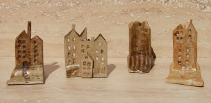 Group of Slab Minis (small constructions) - buildings, some on small hills or mounds